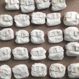 24 newborn g cloth diapers
